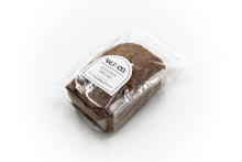 Load image into Gallery viewer, A packaged loaf of peanut butter banana bread from Salt &amp; Co, neatly wrapped in clear plastic with a label displaying the brand&#39;s logo and product name. The bread&#39;s moist and rich texture is visible through the packaging, making it an appealing choice for customers seeking a tasty, ready-to-eat treat.
